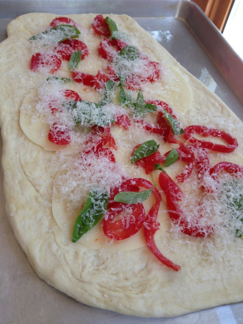 Vegetarian Focaccia with tomato, basil, provolone and parmesan