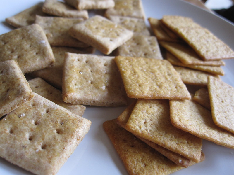 Homemade Flax and Honey Crackers on the left, store bought Wheat Thins on the right